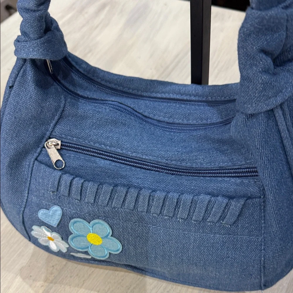 Chic Blue Denim Hobo Bag with Floral Accents